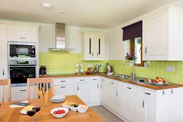 The kitchen is very light and airy and has all you need to cook up a treat.