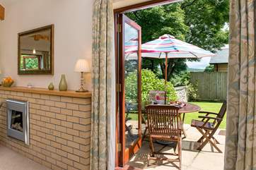 Double doors lead out to the patio and garden.