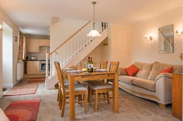 The dining-area with the stairs behind leading to the bedrooms on the first floor.