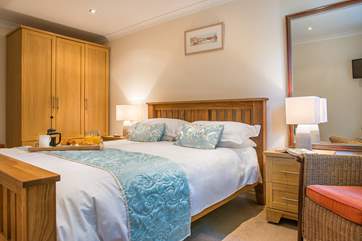 Both bedrooms are beautifully furnished and have lovely crisp white linen.
