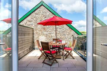 The upper terrace area is the ideal spot to enjoy al fresco dining.