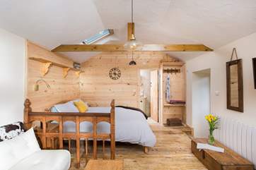 The light yet cosy open plan living-room.