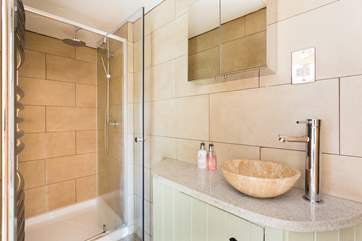 The shower-room has a large shower cubicle with rainforest shower head.