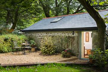 You have a private terrace to the rear of the cottage.