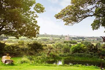 The terrace overlooks the Owners' garden to the hills beyond.