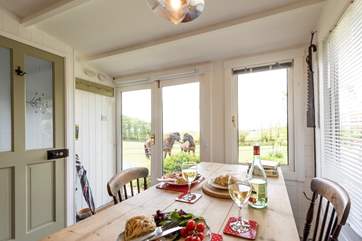 The view of the pretty meadow (and ponies!) can be enjoyed from here too.
