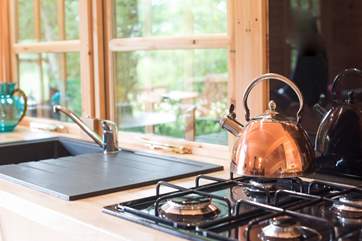 There's a full size gas hob and oven.