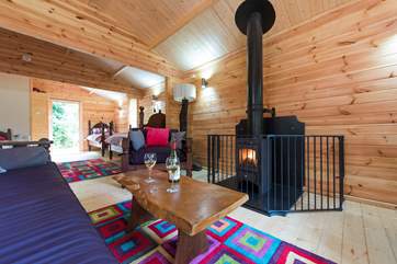 The cabin is spacious, warm and furnished with beautiful East African hardwood furniture and gorgeously coloured textiles.