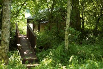 The bridge from the playing meadow back to the safari tent and cabin.