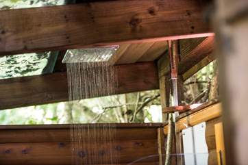 The outdoor shower has hot water...no need to freeze just because you're showering al fresco!