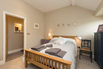 This is the master bedroom with the en suite shower-room through the door to the left of the photograph.