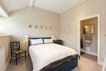 This is the master bedrooom with its en suite shower-room through the door to the right.