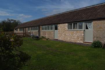 This is the sunny enclosed garden for this welcoming semi-detached, single storey cottage.