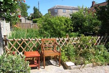 Sitting out in the traditional cottage front garden is just as lovely.