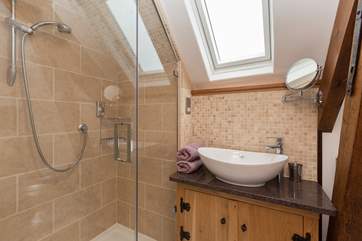 This is the en suite for the second double bedroom. A low beam adds character but do mind your head.