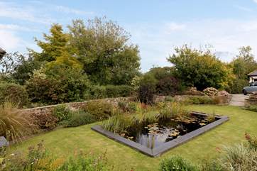 To the front of the cottage there is a beautiful sunken garden with a deep pond. This is a communal area which guests at Dreamcatcher can also enjoy but you do have your privacy in your own back yard.