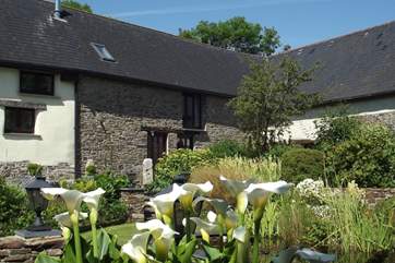 Moonseeker is the stone fronted part of this beautifully restored barn.
