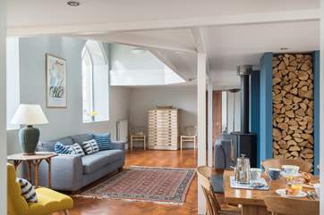 Looking further into the huge sitting/dining-room.