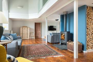 The sitting-area around the wood-burner.