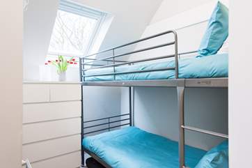 Bedroom 4 is a cosy bunk-room.