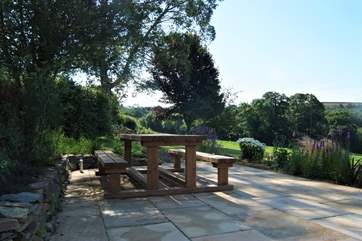 The dining terrace in dappled morning sunshine...what a spot for breakfast!
