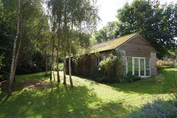 This is the setting for the games-room, with the boules court next to it.