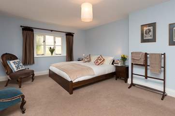 This is the first floor master bedroom (2), also with a king-size bed and wonderful views across the gardens.