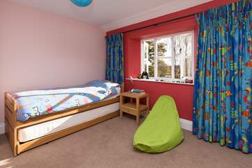 This is bedroom 4 - shown with the truckle bed tucked away - this room will normally be set up as a twin.