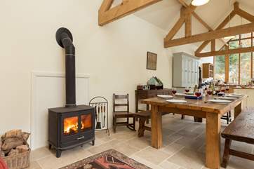 The kitchen/dining-room even has a wood-burning stove and sofa, just out of view, so that you can all enjoy this most sociable of rooms.