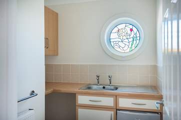 The handy first floor utility has a fridge for your milk (and wine) and a kettle so you can top up your mug (or glass) without a trip down to the kitchen.