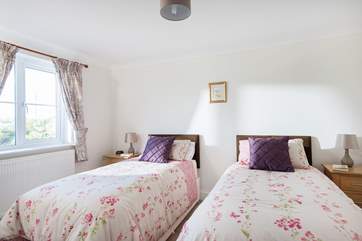 Two 3ft single beds and a view over the village to the front of the cottage.(Bedroom 2)