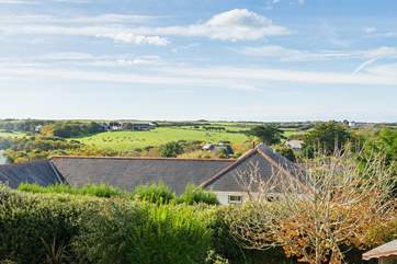 The wonderful views from the upstairs sitting-room and a twin bedroom.