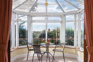 The light and bright conservatory.