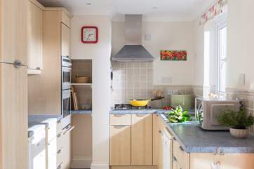 The kitchen overlooks the garden.