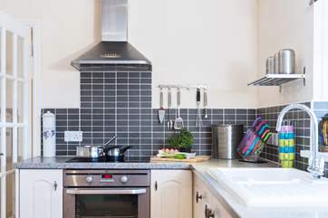 The kitchen is spacious and very well-equipped.