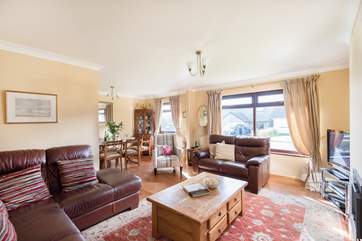 The open plan living and dining space is great for relaxing with family and friends.