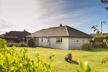 There is a huge back garden that surrounds the rear and side of the property.