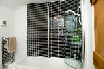 Enjoy time soaking in the bath in the en suite bathroom of Bedroom 2.