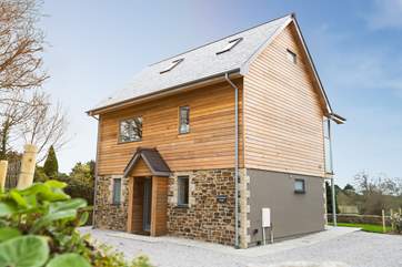 There is plenty of parking to the side and in front of the house, you also have a private garden to the front oppposite the house.