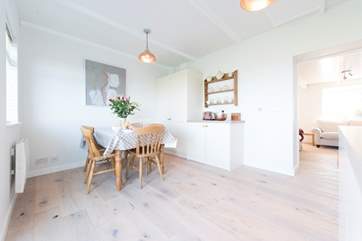 The dining-area leads through to the sitting-area,