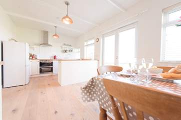 French windows lead out to the small terrace which has lovely sea views.