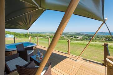 Sunrise Safari Tent looking straight out to sea over the countryside below.