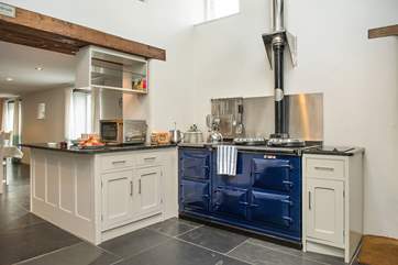 The kitchen has an impressive four-oven Aga.