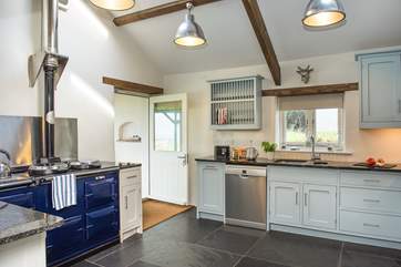 The kitchen creates a warm welcome from the minute you step inside.