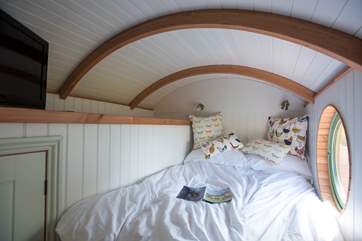 The lovely mezzanine bedroom even has a TV.