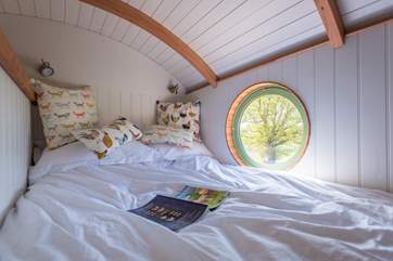 What a beautiful view from the double bed with its luxury bed linen.