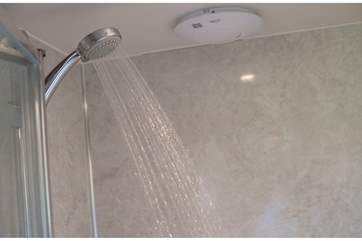 It wouldn't be glamping without an en suite shower-room with flushing loo and hot and cold running water!