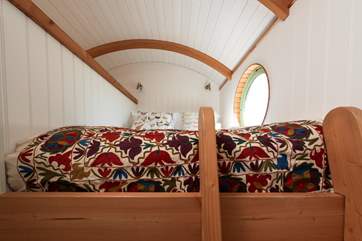 A comfy bed to dive into after a day out and about exploring.