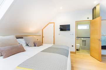 This bedroom has both a dressing room next door and an en-suite shower-room.