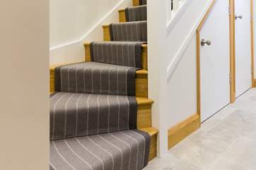 The stairs up to the first floor living room.